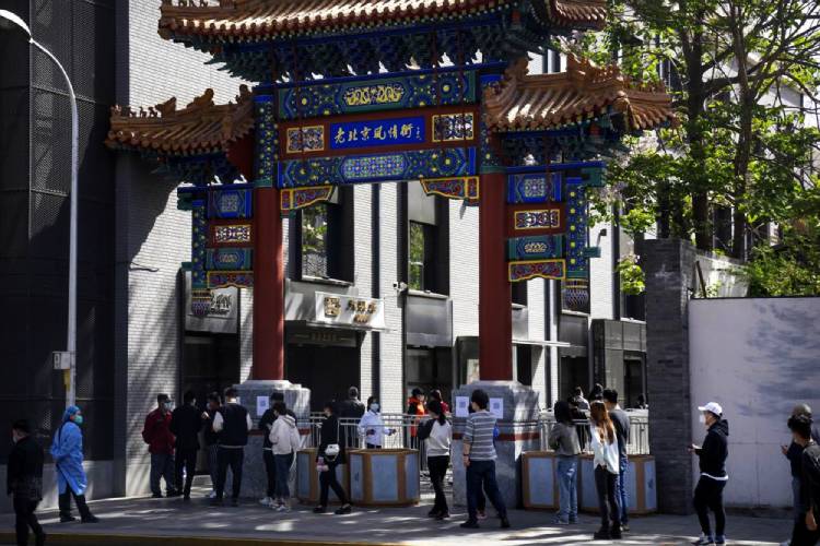 Beijing enforces lockdowns